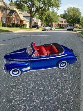 Welly 1941 Chevrolet Special Deluxe diecast model car Blue/ Red
